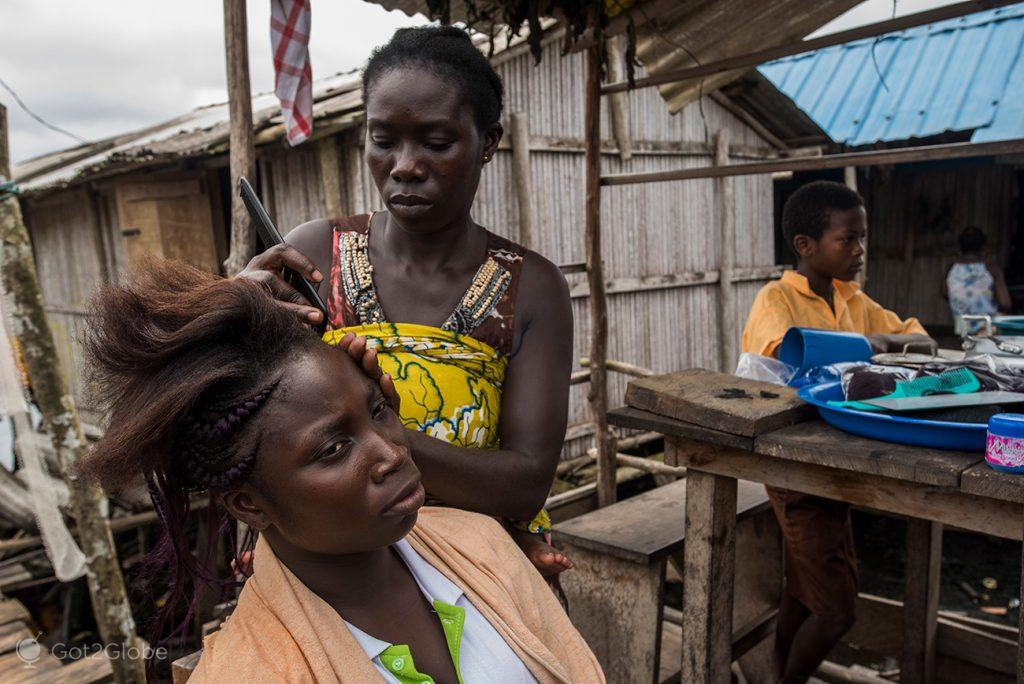 Hairdressing session in Nzulezu, Ghana