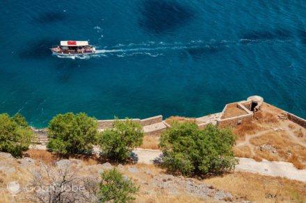 Boat sailing off the western coast of Spinalonga